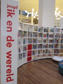 "Me in the word" includes boks about sports, religion, sociology and the human body, among other topics. Vertical shelf labels are typical in Dutch public libraries.